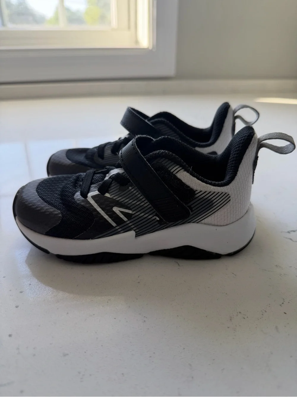 New Balance Black and White Kids Velcro Sneakers